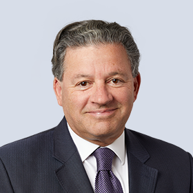 A portrait photograph of Brambles' Chief Executive Officer, Graham Chipchase