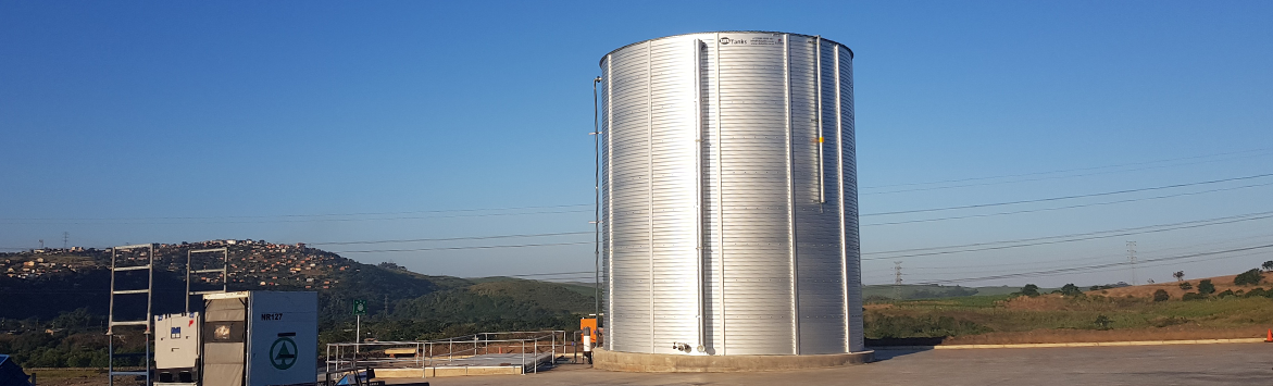 A banner image featuring a photograph of a cylindrical storage tank
