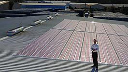 A thumbnail image features a screen capture from the 'New printed solar technology' video. The screen capture consists of a man standing on a colourbond like roof in front of some solar panels.