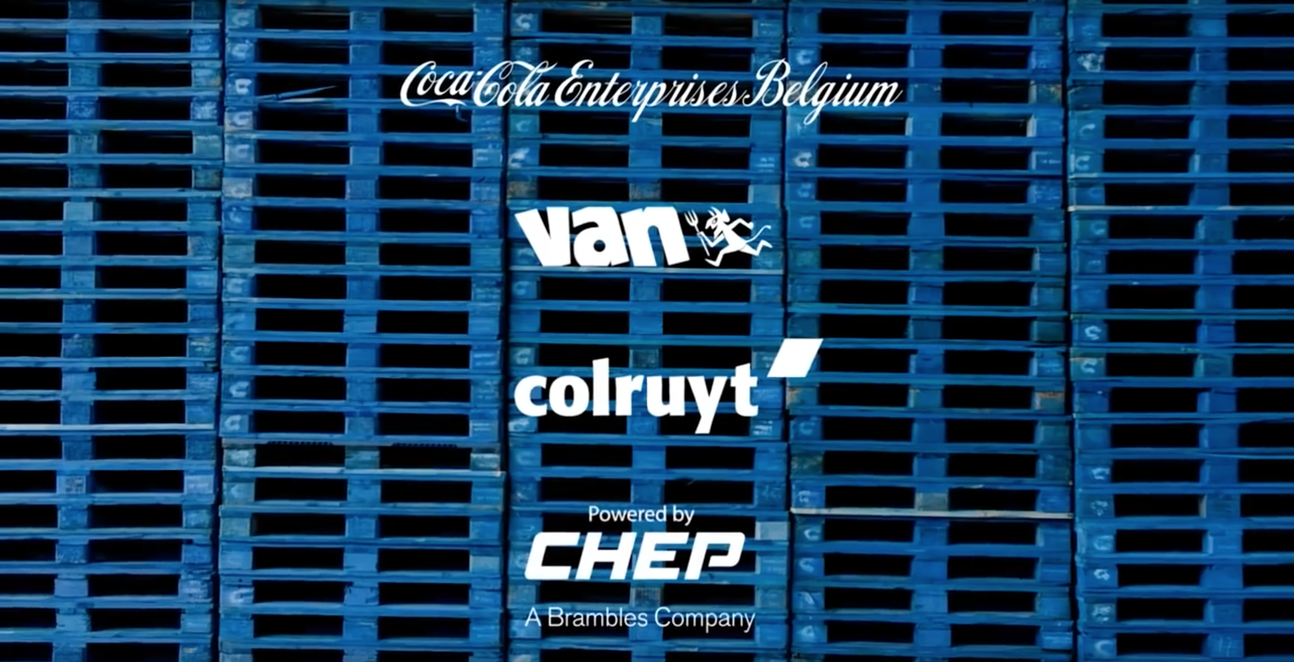 A video thumbnail image featuring a screen capture from the 'Supply-chain collaboration' video. The screen capture consists of an close-up shot of stacks of blue CHEP pallets with 4 white logos overlayed on top of which. These logos include the Coca Cola Enterprises Belgium logo, Van, Colruyt, and the powered but CHEP logo.