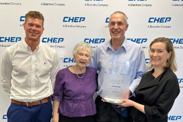 CHEP Australia’s Country General Manager, Renee Holbrook, and  National Account Manager of Retail, Fabian Miebach presenting the Logistics Hall of Fame award  to Oliver Richter’s wife, Pam Richter, and son, Paul Richter.